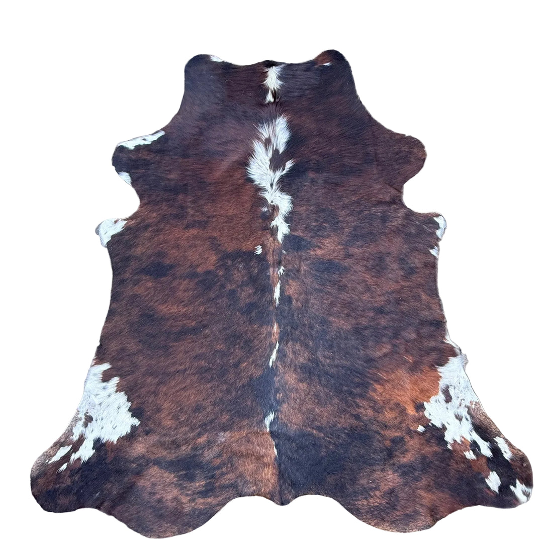 Brown, black  and white cowhide rug 