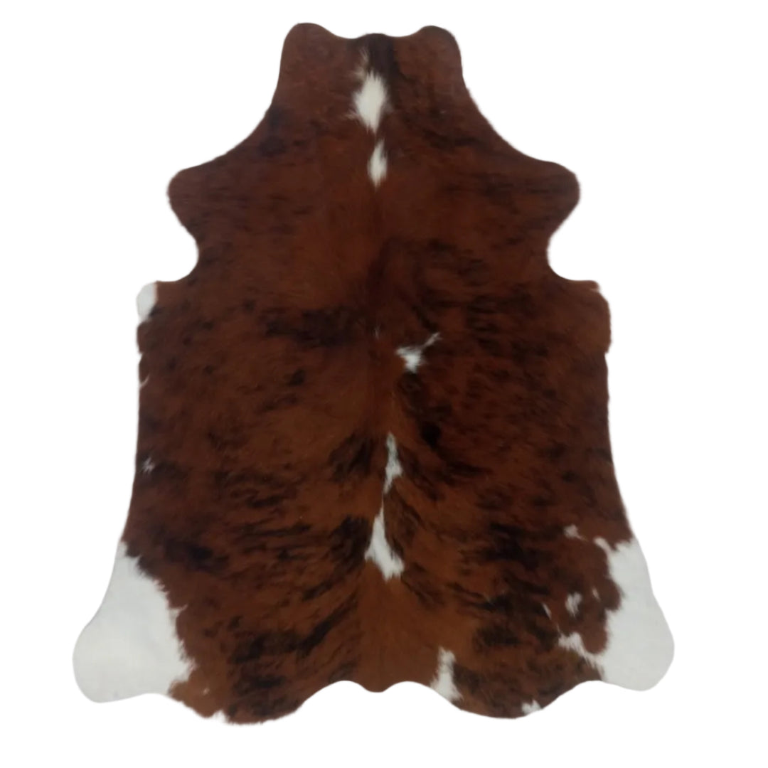 Brown and white cowhide rug o