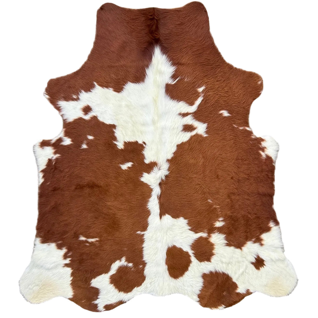 Brown and white cowhide rug 