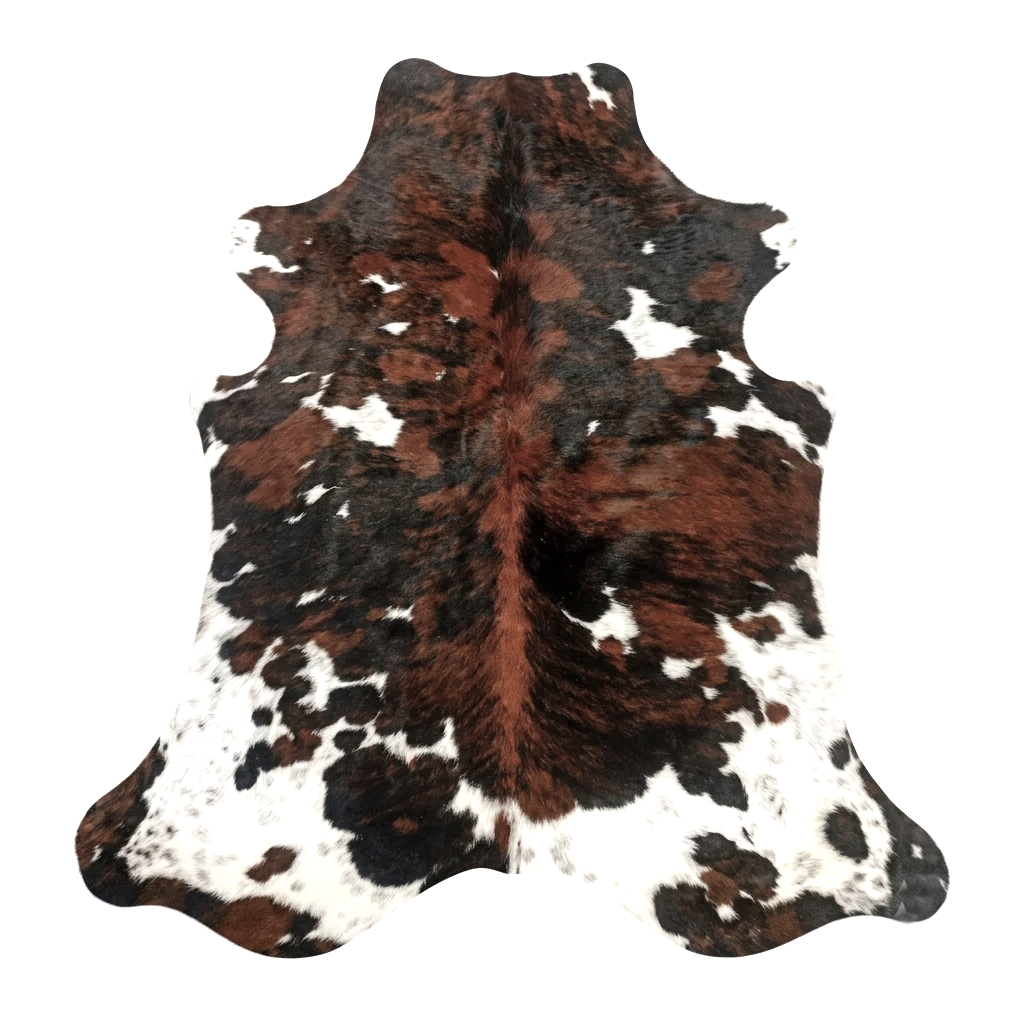 Cowhide rug with brown, black, and white pattern on a white background