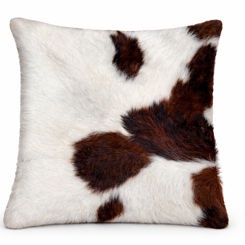 Cowhide cushion with suede reverse, 39cm x 39cm, featuring a natural cowhide pattern and soft suede backing.