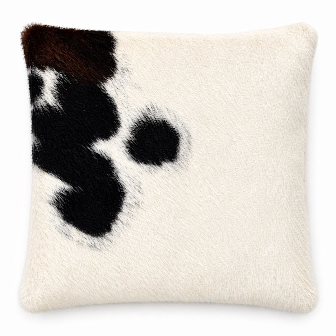 Cowhide Cushion from Cowhide Rugs London, 17x17 inches, with natural cowhide pattern on both sides, soft and durable for home decor.