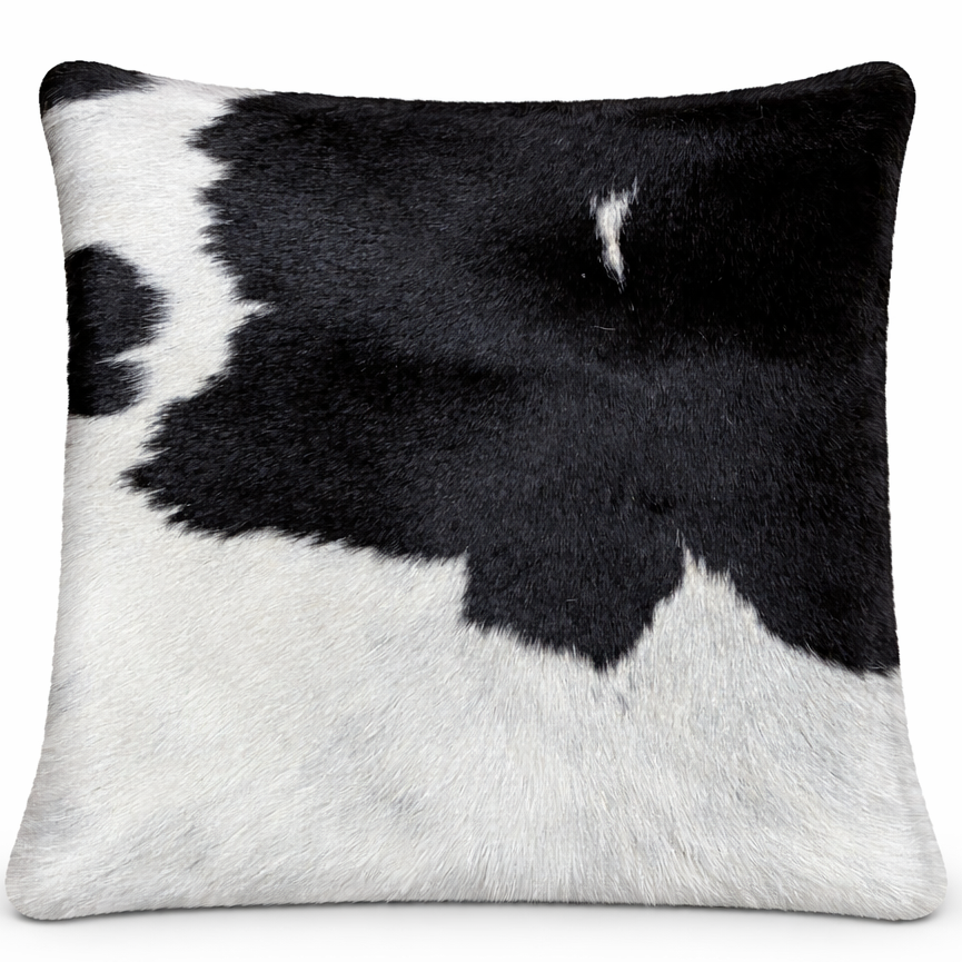 Cowhide cushion with sueded reverse, 39cm by 39cm, showcasing natural cowhide pattern and soft textured surface.