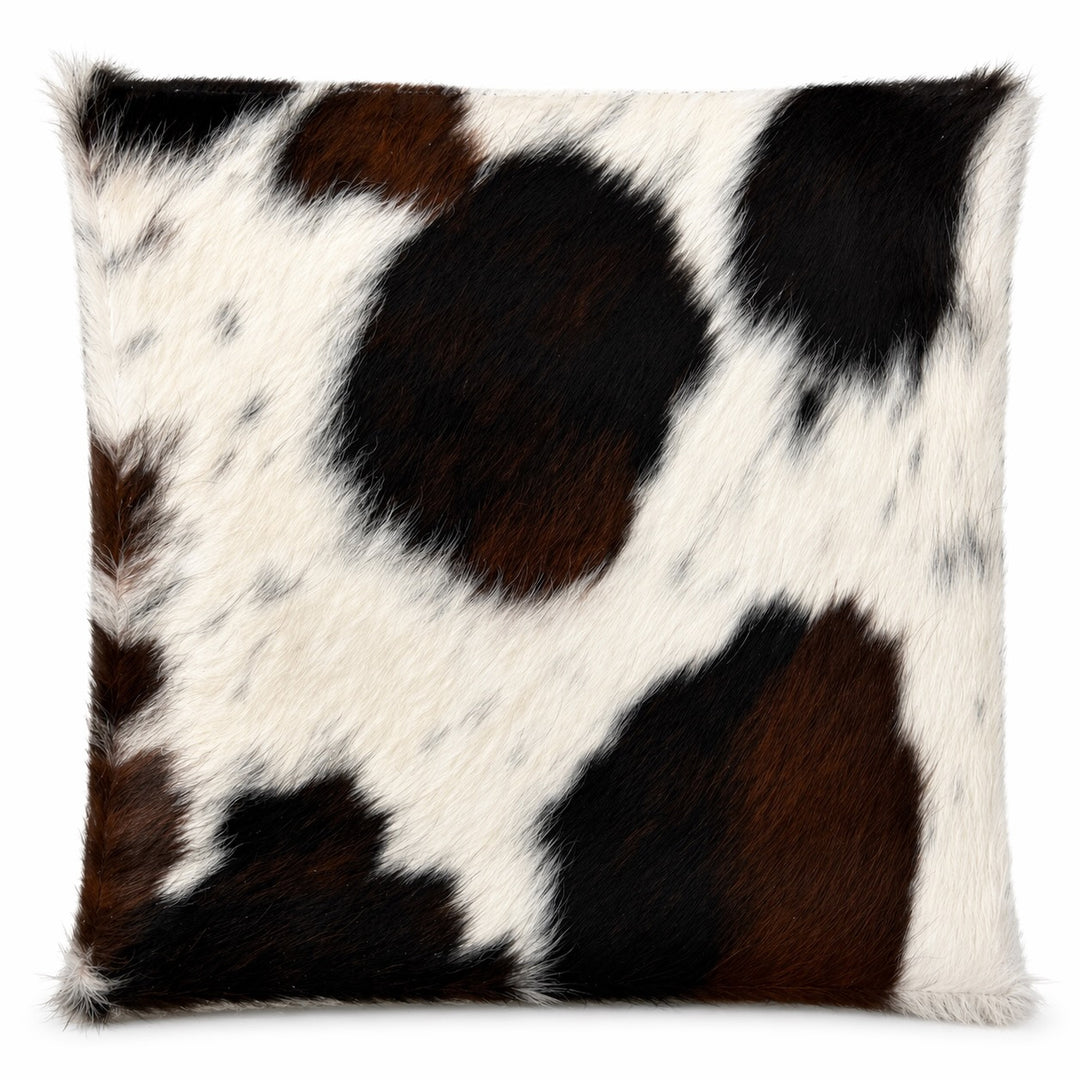 Cowhide cushion from Cowhide Rugs London, 32x39cm, featuring natural cowhide with a textured, two-sided design.