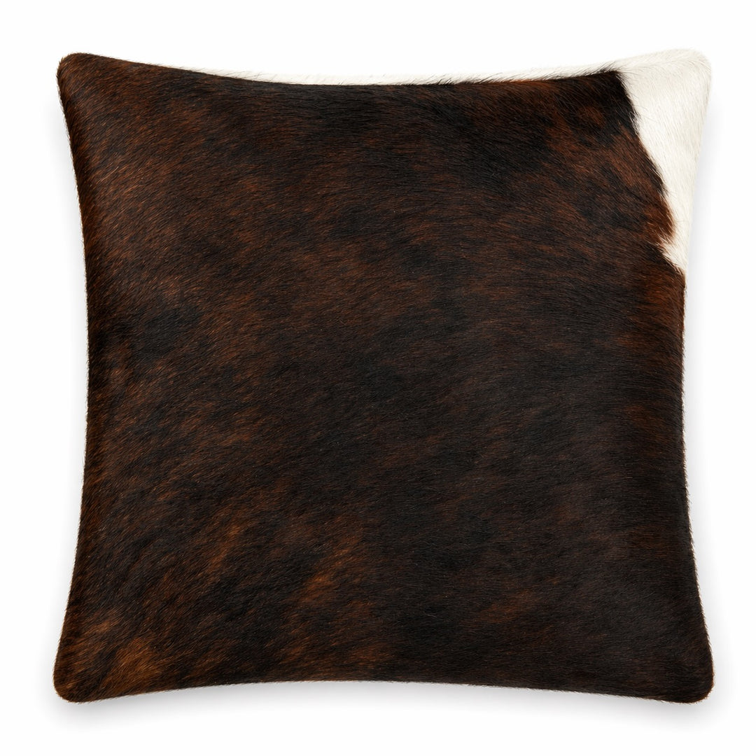 Cowhide cushion from Cowhide Rugs London, 33x39cm, featuring natural cowhide with a textured, mottled brown and white pattern.
