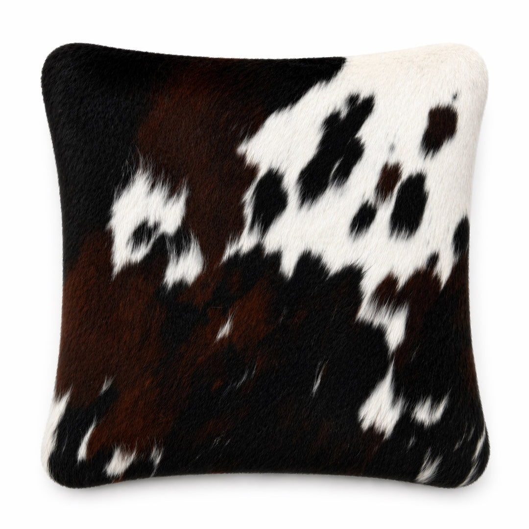 Cowhide cushion from Cowhide Rugs London, 39x39cm, featuring natural cowhide with a distinctive mottled pattern and soft texture.