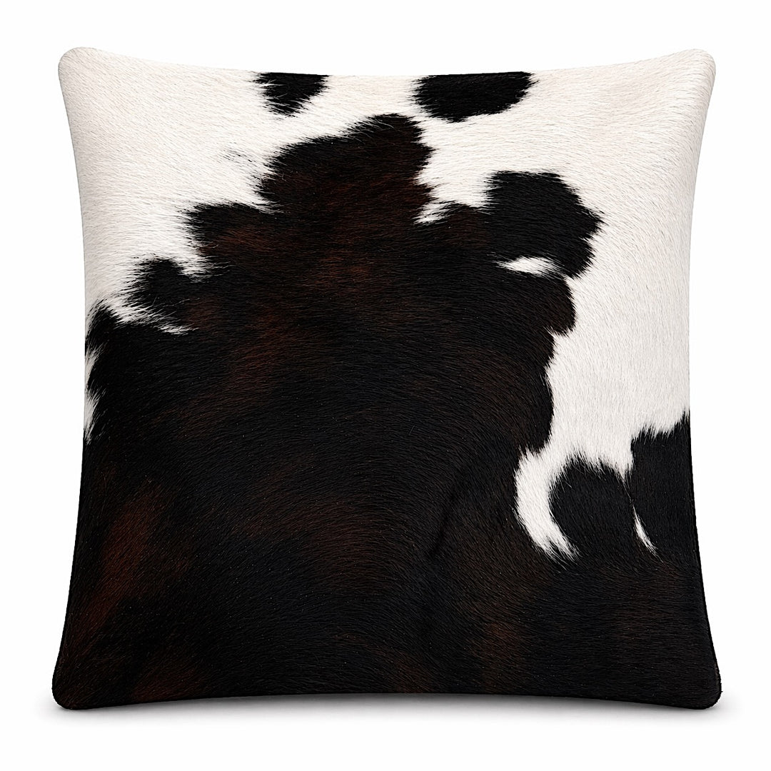 Cowhide cushion with suede reverse, 49cm x 49cm, by Cowhide Rugs London, showcasing natural cowhide and soft suede reverse.