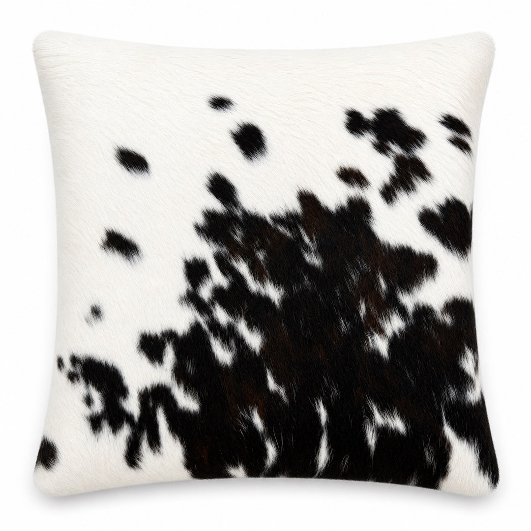 Cowhide cushion by Cowhide Rugs London featuring a cowhide front and suedette reverse, 49cm x 49cm, Ref 77.