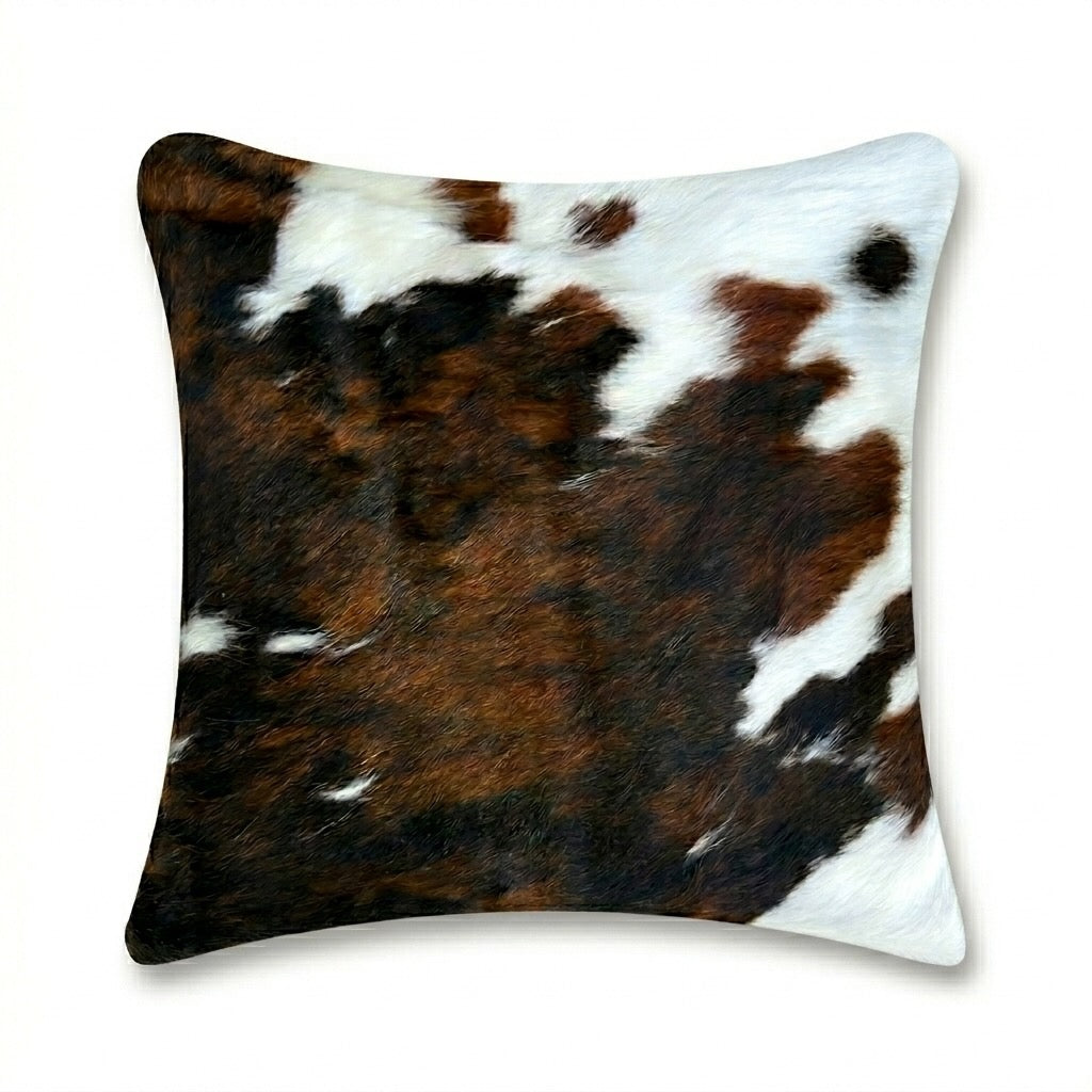 Cowhide cushion with suede reverse, 49cm x 49cm, by Cowhide Rugs London, featuring a natural cowhide pattern and soft suede backing.