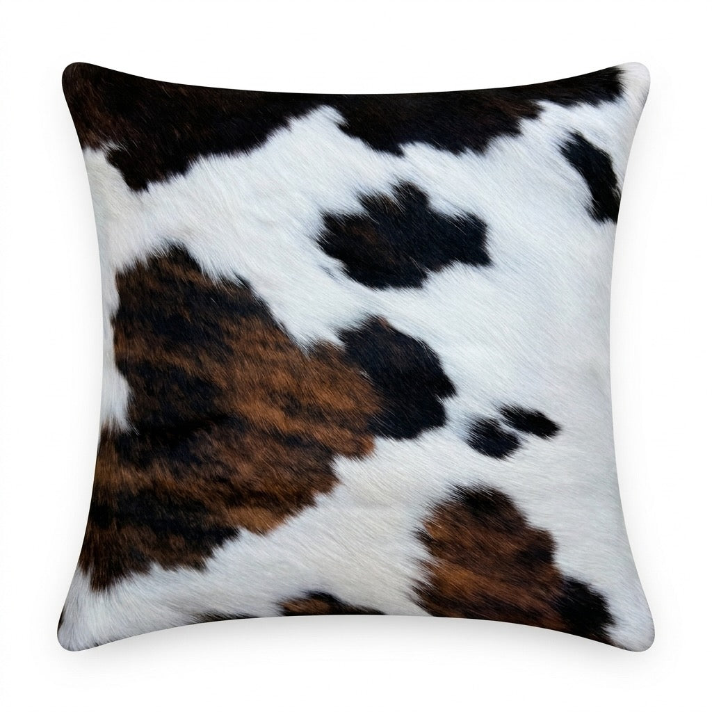 Cowhide cushion from Cowhide Rugs London, reverse Suedette design, 49cm x 49cm, featuring a natural cowhide pattern and soft texture.