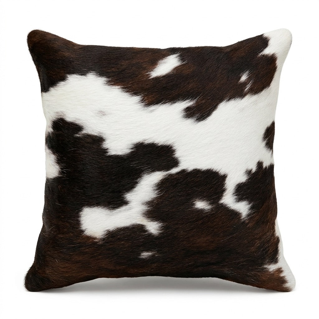 Cowhide cushion from Cowhide Rugs London, 49cm x 49cm, with cowhide on one side and suedeette on the reverse, stylish and durable.