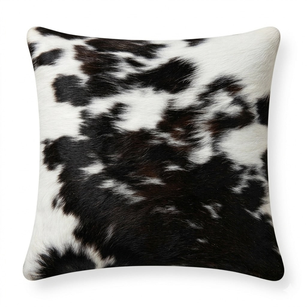Cowhide cushion with suede reverse, 49cm x 49cm, by Cowhide Rugs London, featuring a natural cowhide pattern and soft suede backing.