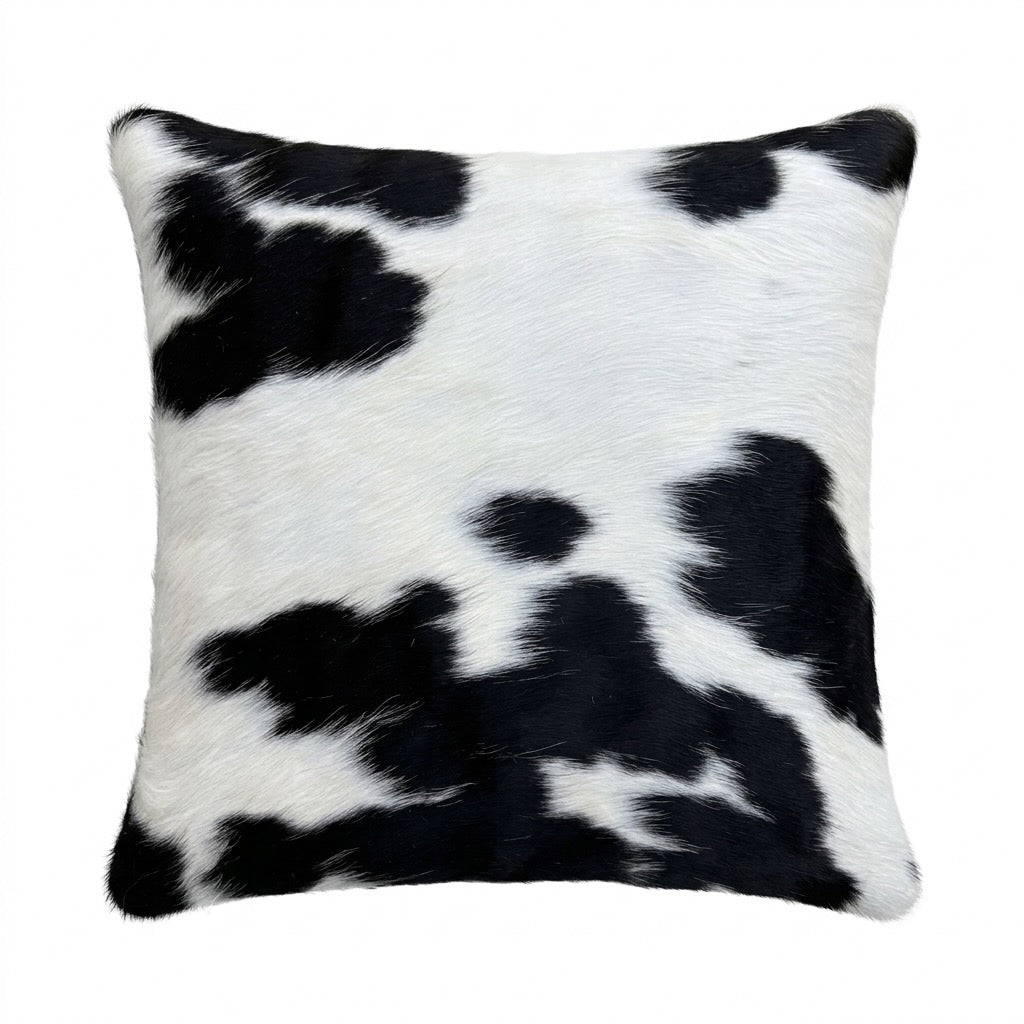 Cowhide cushion with suede reverse, 49cm x 49cm, by Cowhide Rugs London, featuring natural cowhide pattern and soft suede backing.