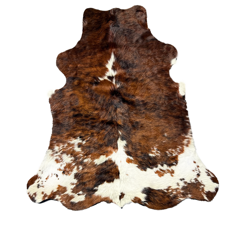 cowhide rug brown white black