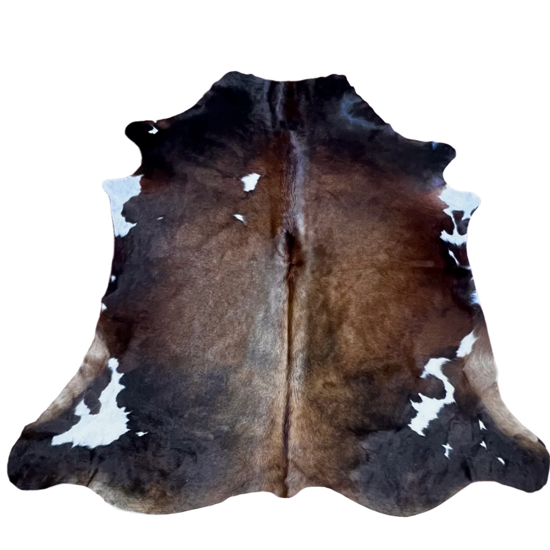Large Cowhide Rug by Cowhide Rugs London, 210cm x 194cm, natural cowhide with unique pattern and texture, over £200.