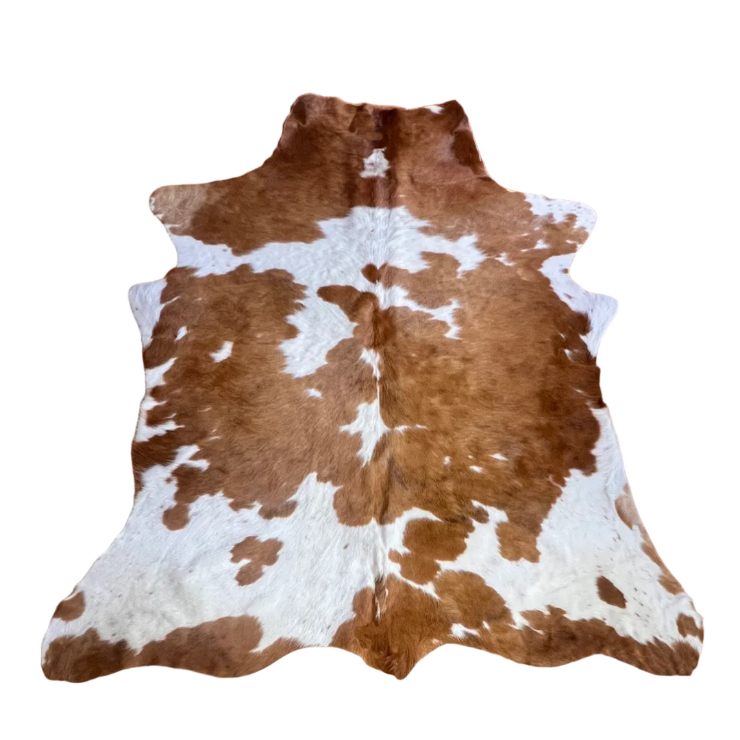 Large cowhide rug from Cowhide Rugs London, 201cm x 167cm, natural brown and white cowhide pattern for stylish home decor.