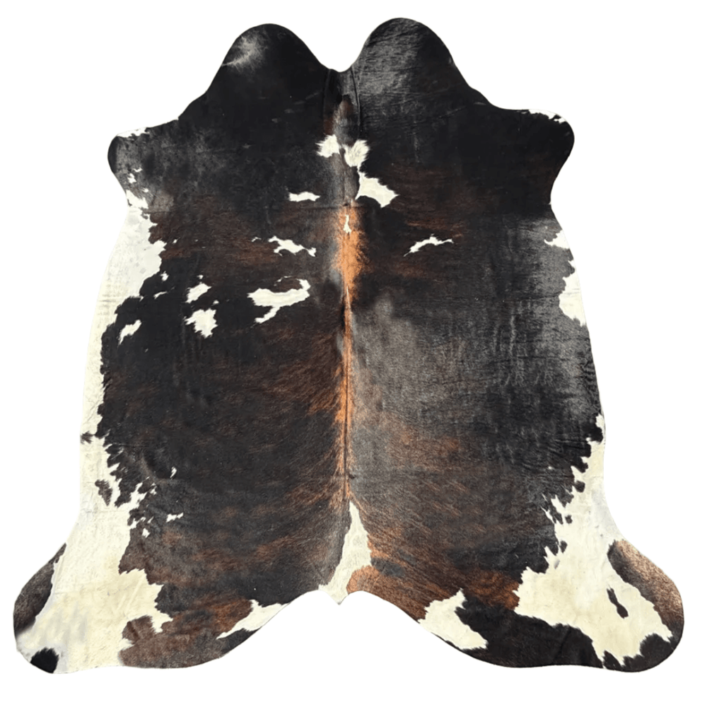 Large premium cowhide rug from Cowhide Rugs London, 240cm x 215cm, showcasing natural cowhide pattern and texture.