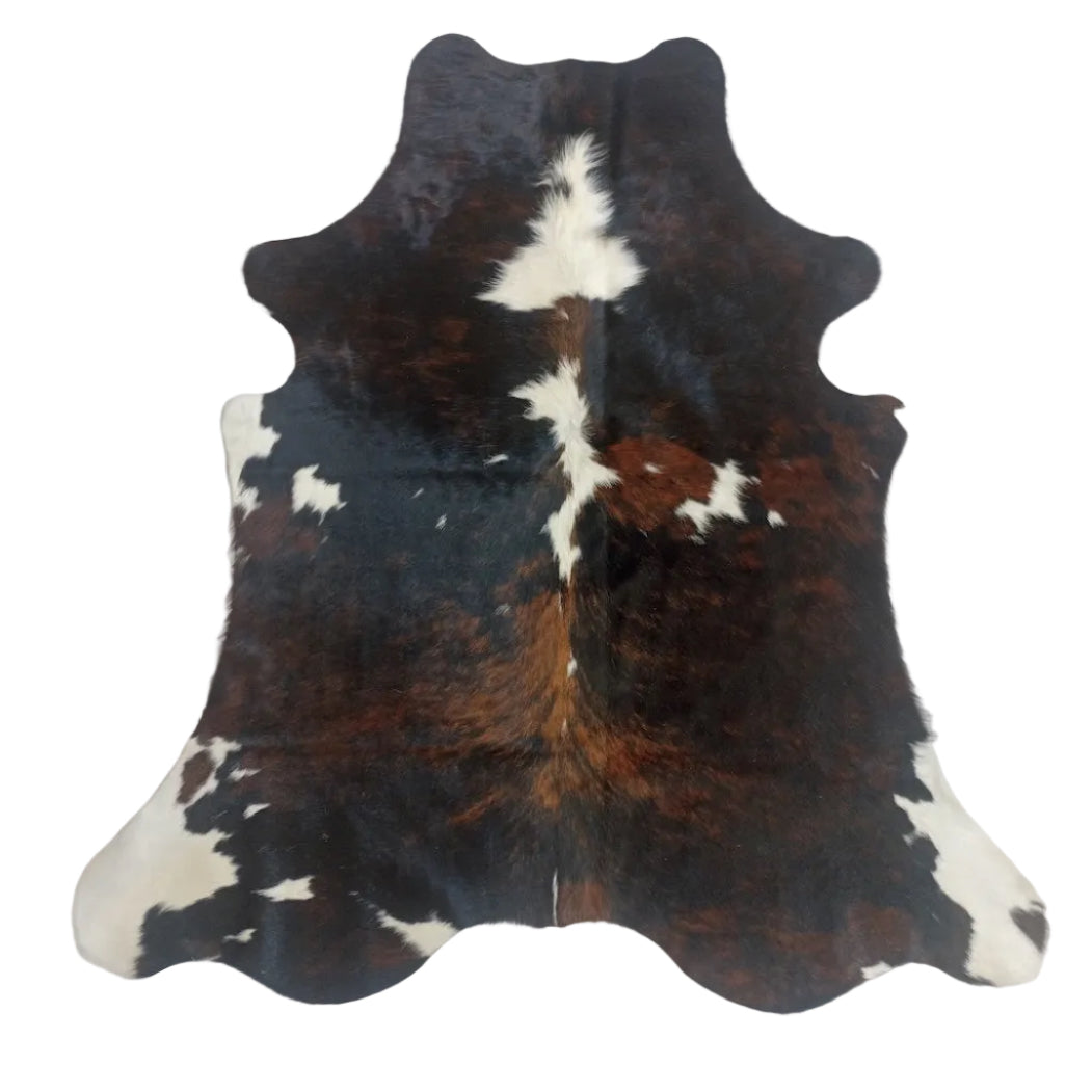 Small cowhide rug from Cowhide Rugs London, 190cm x 167cm, natural cowhide with a unique pattern and soft texture.