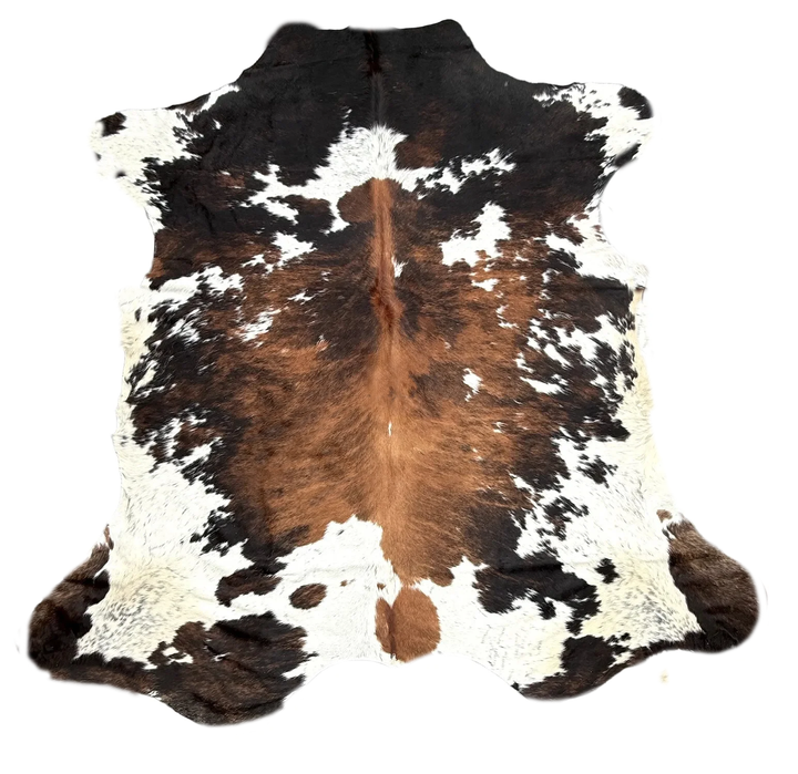 Cowhide rug with brown, black, and white pattern on a white background