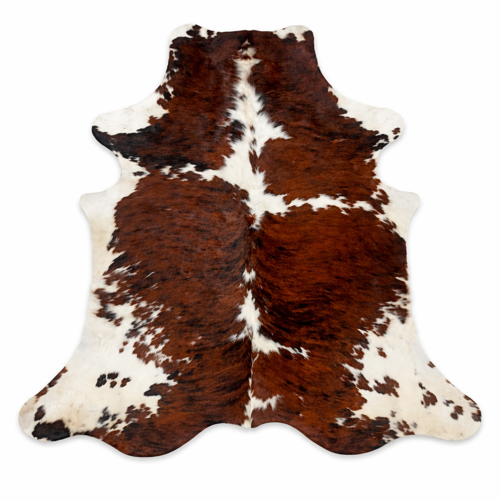 Extra large tricolour cowhide rug by Cowhide Rugs London, 230x220cm, with distinctive black, white, and brown patches.