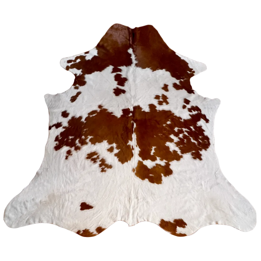 Cowhide Rug by Cowhide Rugs London, 212cm x 194cm, natural cowhide pattern with black, white, and brown patches.
