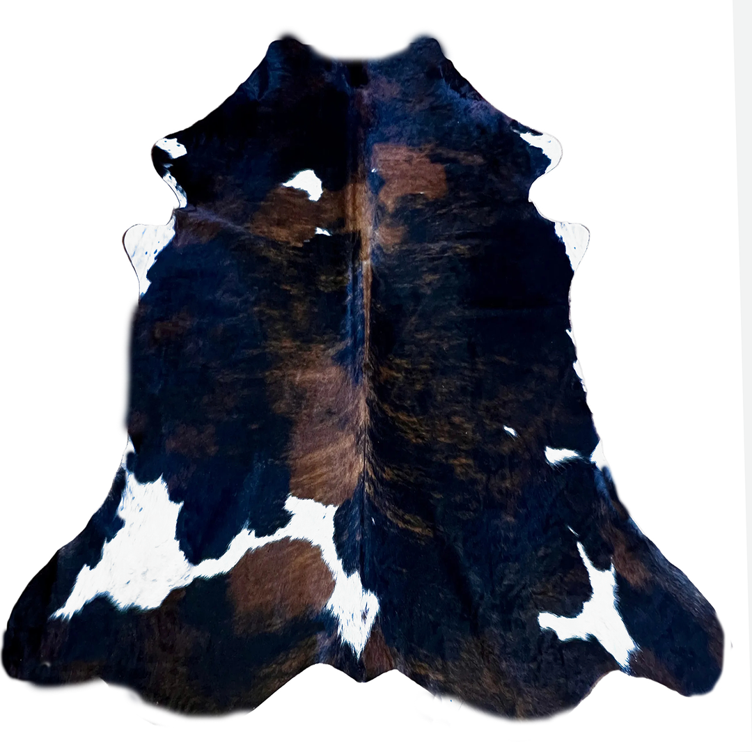Brown and white cowhide rug 
