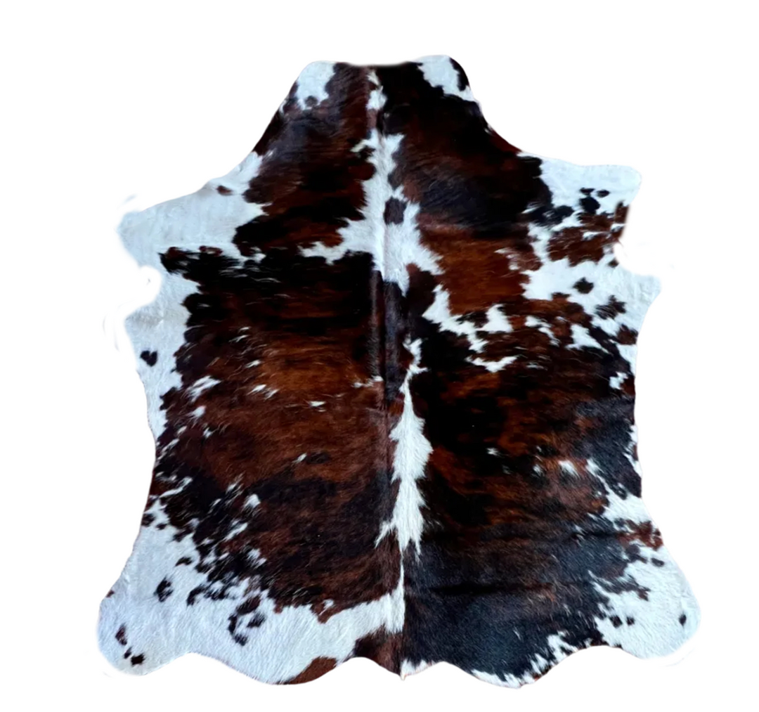 Brown black  and white cowhide rug 