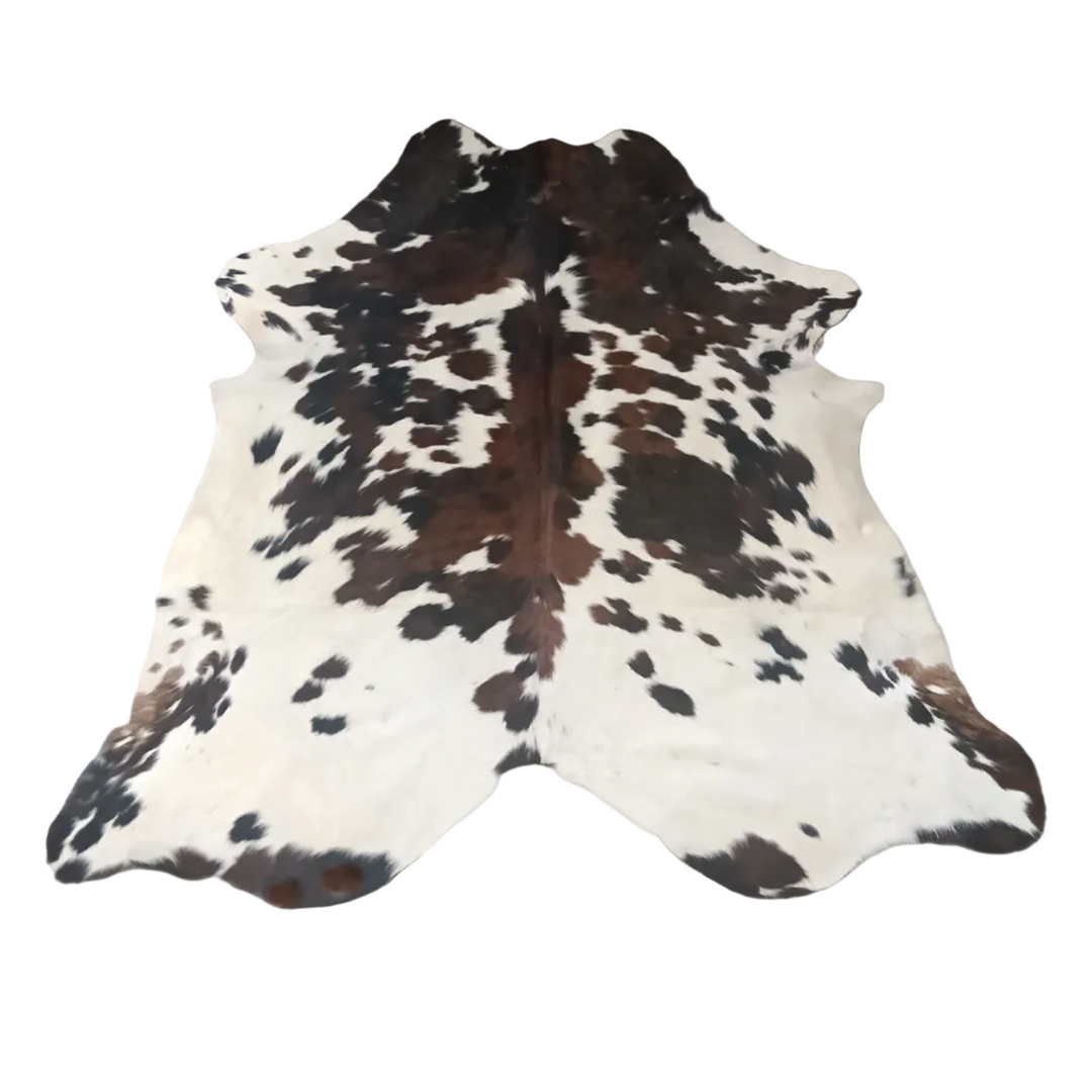 AU3119 cowhide rug by Cowhide Rugs London, 190cm x 180cm natural hide with distinctive markings
