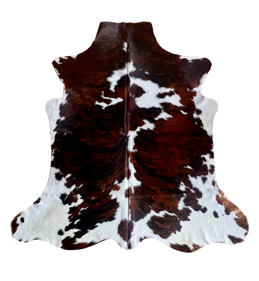 Large Cowhide Rug by Cowhide Rugs London, AU99, 180cm x 175cm, natural cowhide with distinctive markings and a soft, plush texture.