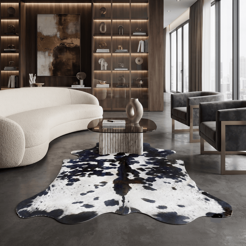 Black and white premium cowhide rug from Cowhide Rugs London, 235cm x 208cm, featuring natural cowhide pattern and texture.