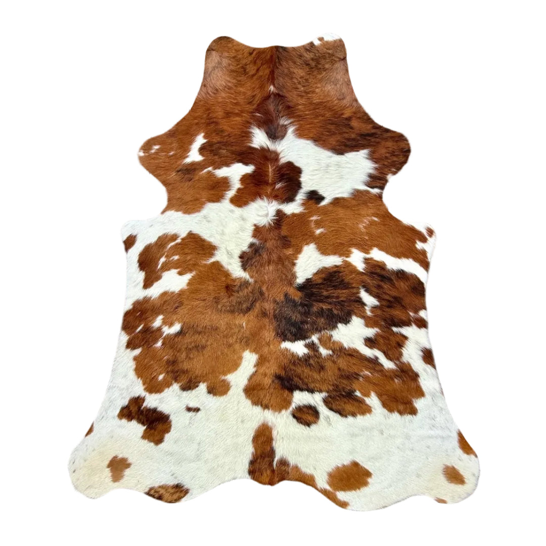 Brown and white cowhide rug l