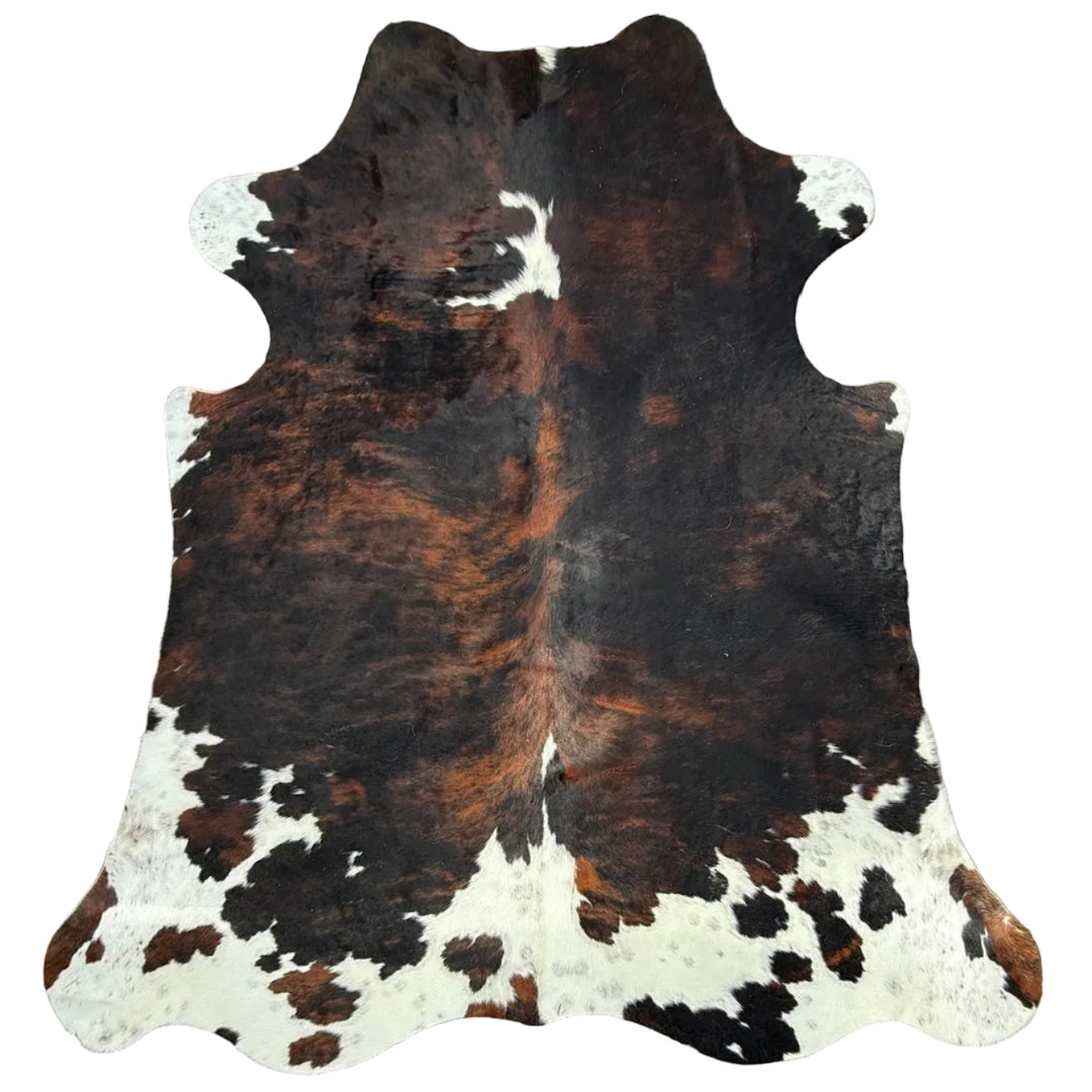 Cowhide rug with brown, black, and white 