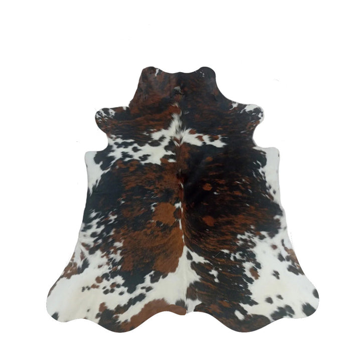 Brown, black, and white cowhide rug 