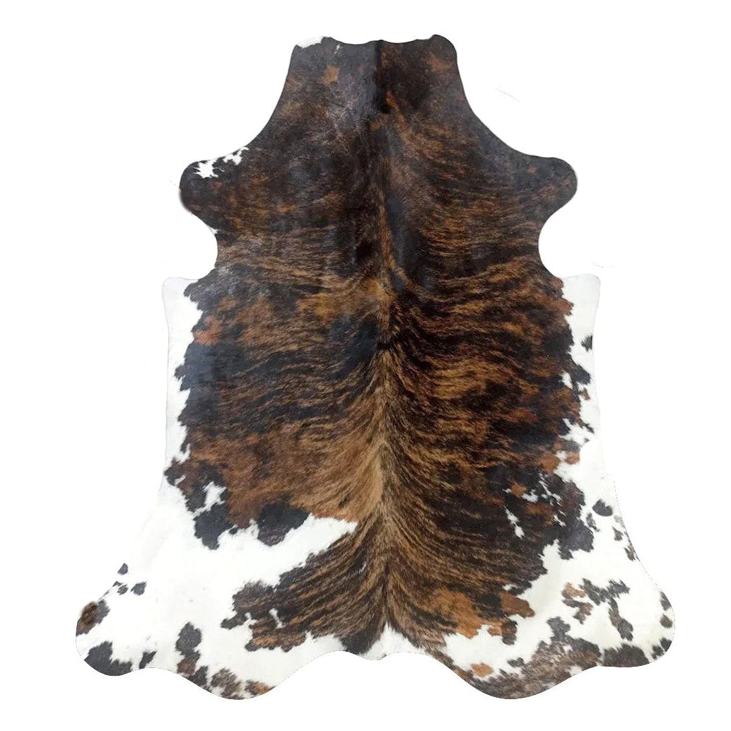 Cowhide rug with black, brown, and white 
