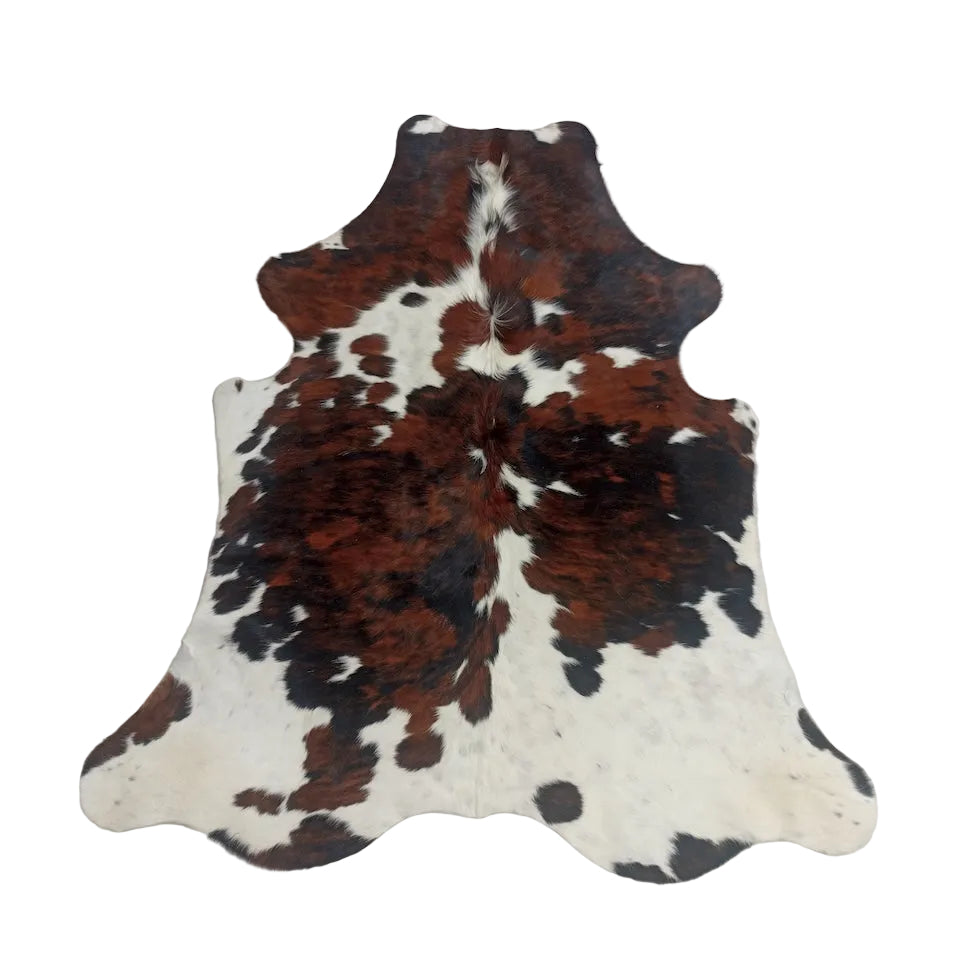Large Cowhide Rug from Cowhide Rugs London, 1.82m x 1.64m, natural cowhide with unique patterns and textures.
