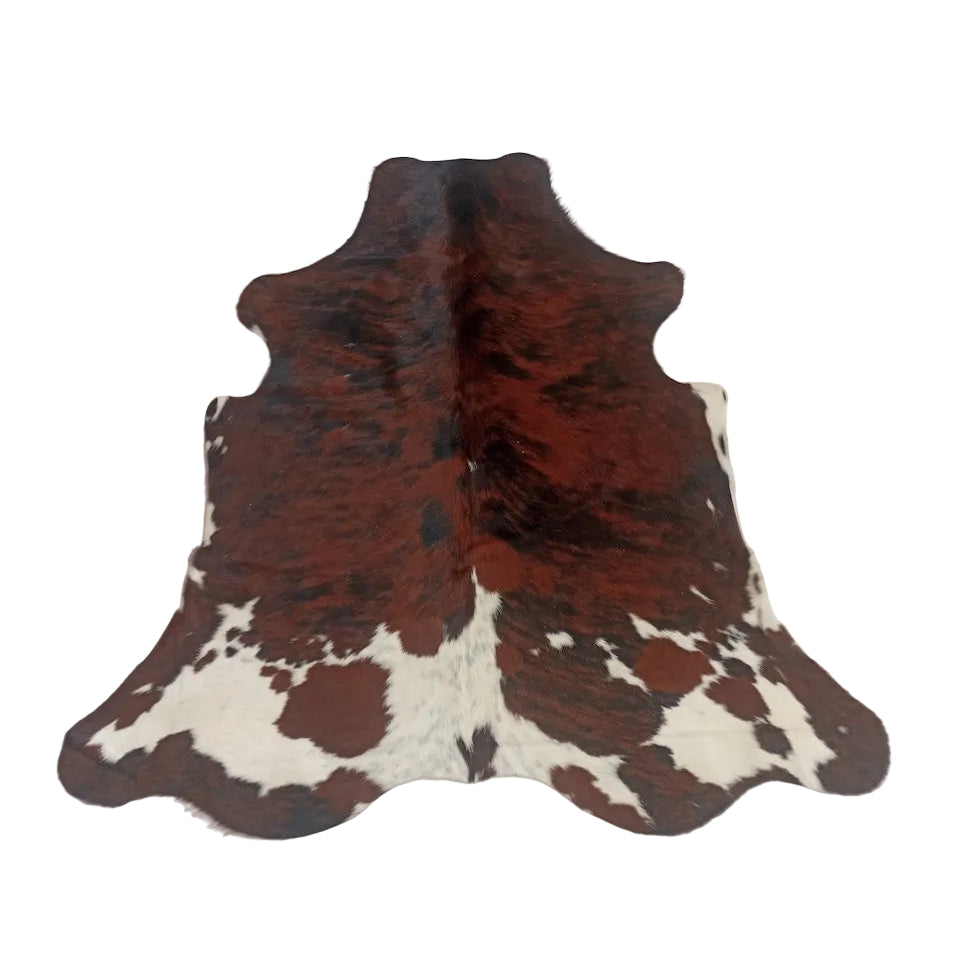 Large cowhide rug from Cowhide Rugs London, 1.73m x 1.71m, natural brown and white cowhide pattern.