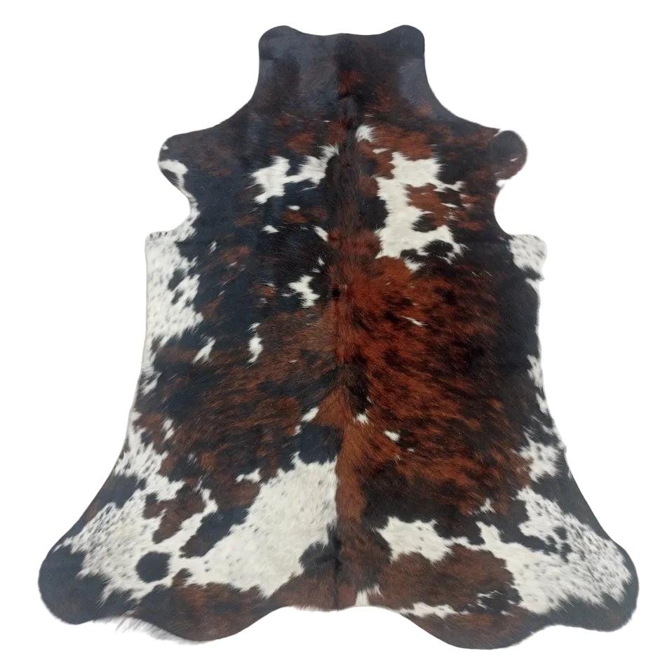 Cowhide Rug from Cowhide Rugs London, 1.82m x 1.46m, natural cowhide with a distinctive pattern and soft texture.