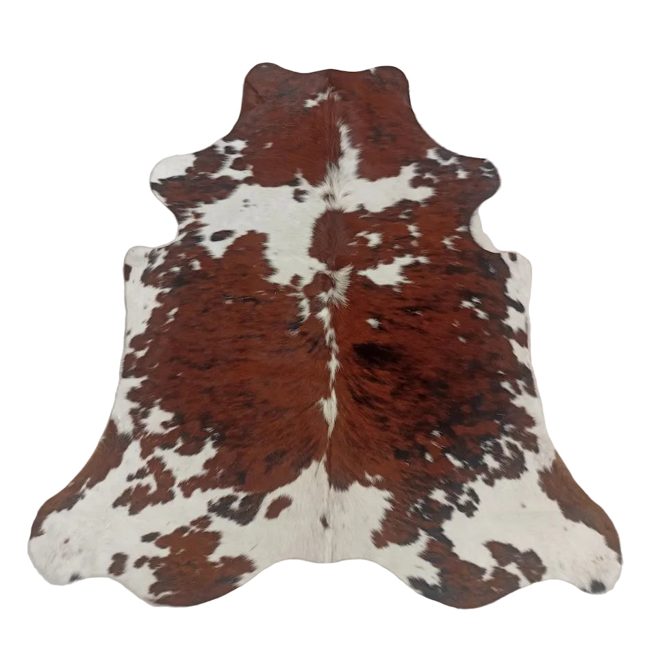 Cowhide Rug by Cowhide Rugs London, size 1.78m x 1.63m, featuring natural brown and white patches on a plush hide surface.