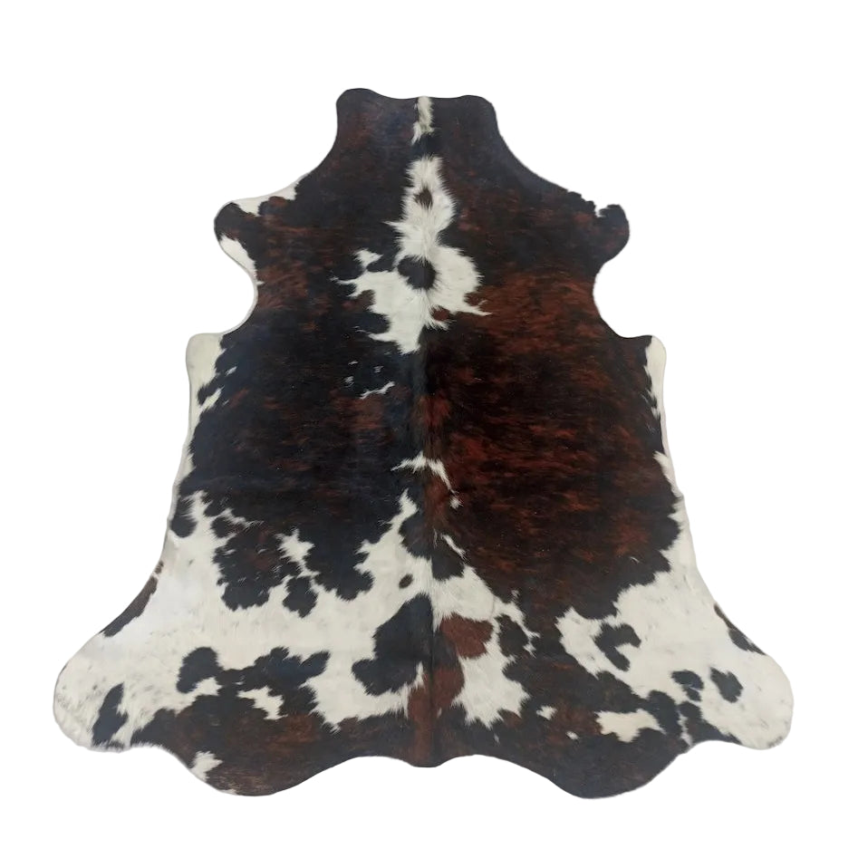 Cowhide rug from Cowhide Rugs London, size 1.74m x 1.56m, featuring natural cowhide pattern and texture.