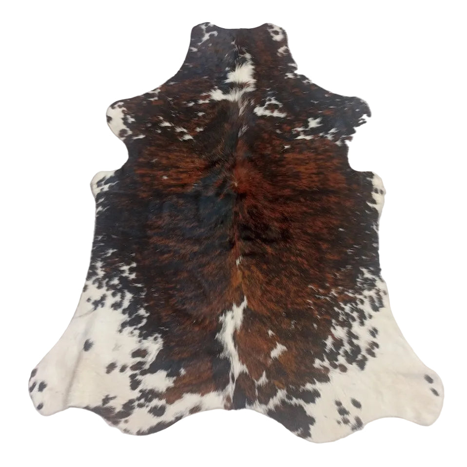 Natural cowhide rug from Cowhide Rugs London, measuring 1.79m x 1.50m, featuring a unique, rustic hide pattern.