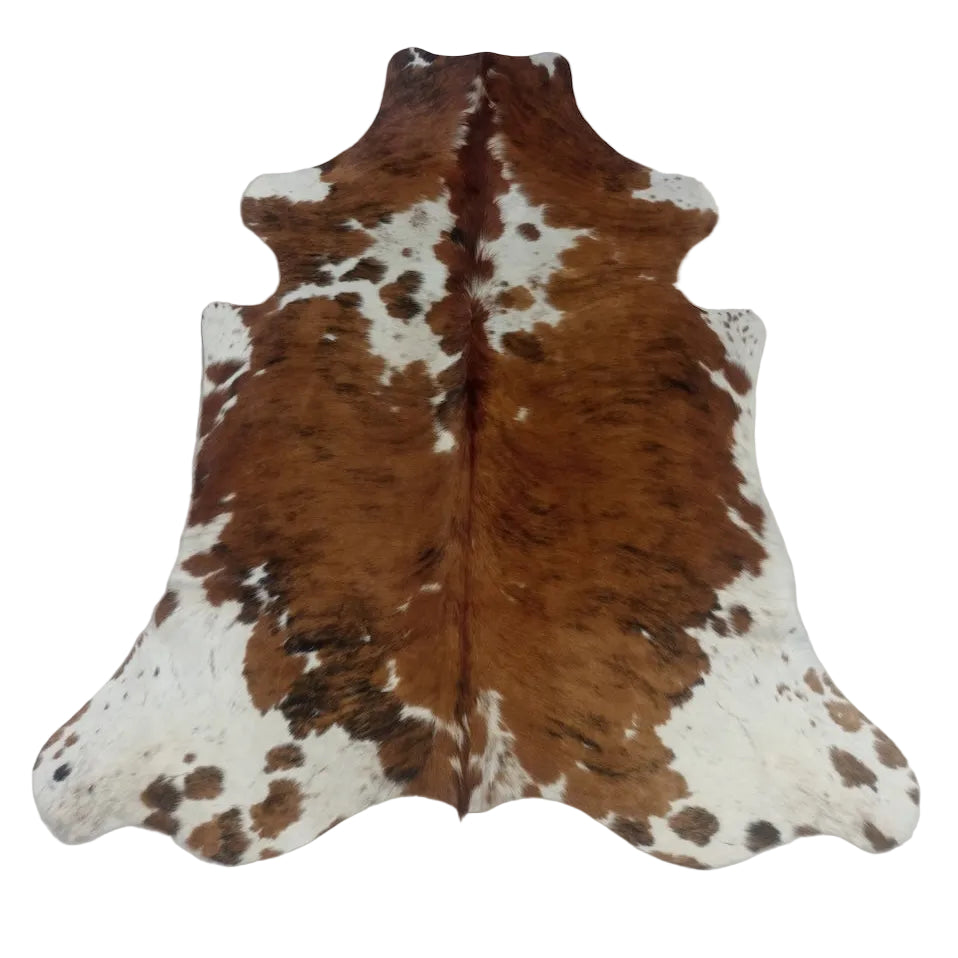 Cowhide Rug from Cowhide Rugs London in size 1.83m x 1.64m, natural brown and white cowhide pattern, with irregular shape and texture.