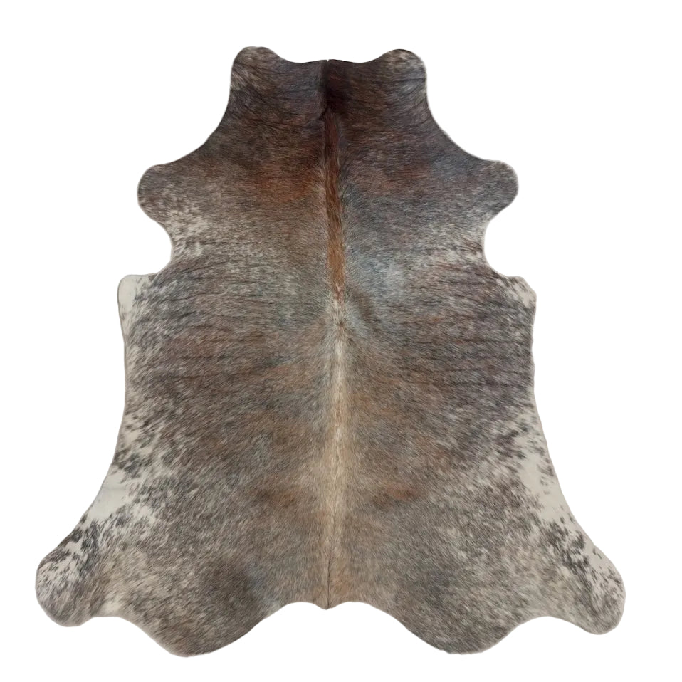 Natural cowhide rug from Cowhide Rugs London, 1.82m x 1.55m, showcasing the unique pattern and texture of a premium cowhide.