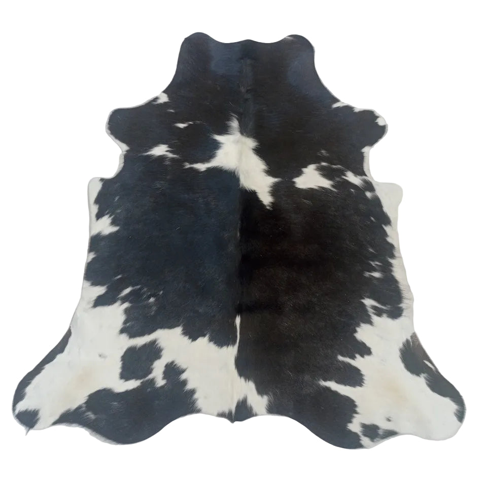 Cowhide Rug London in size 1.83m x 1.68m, natural cowhide with distinctive patterns and textures on a neutral background.