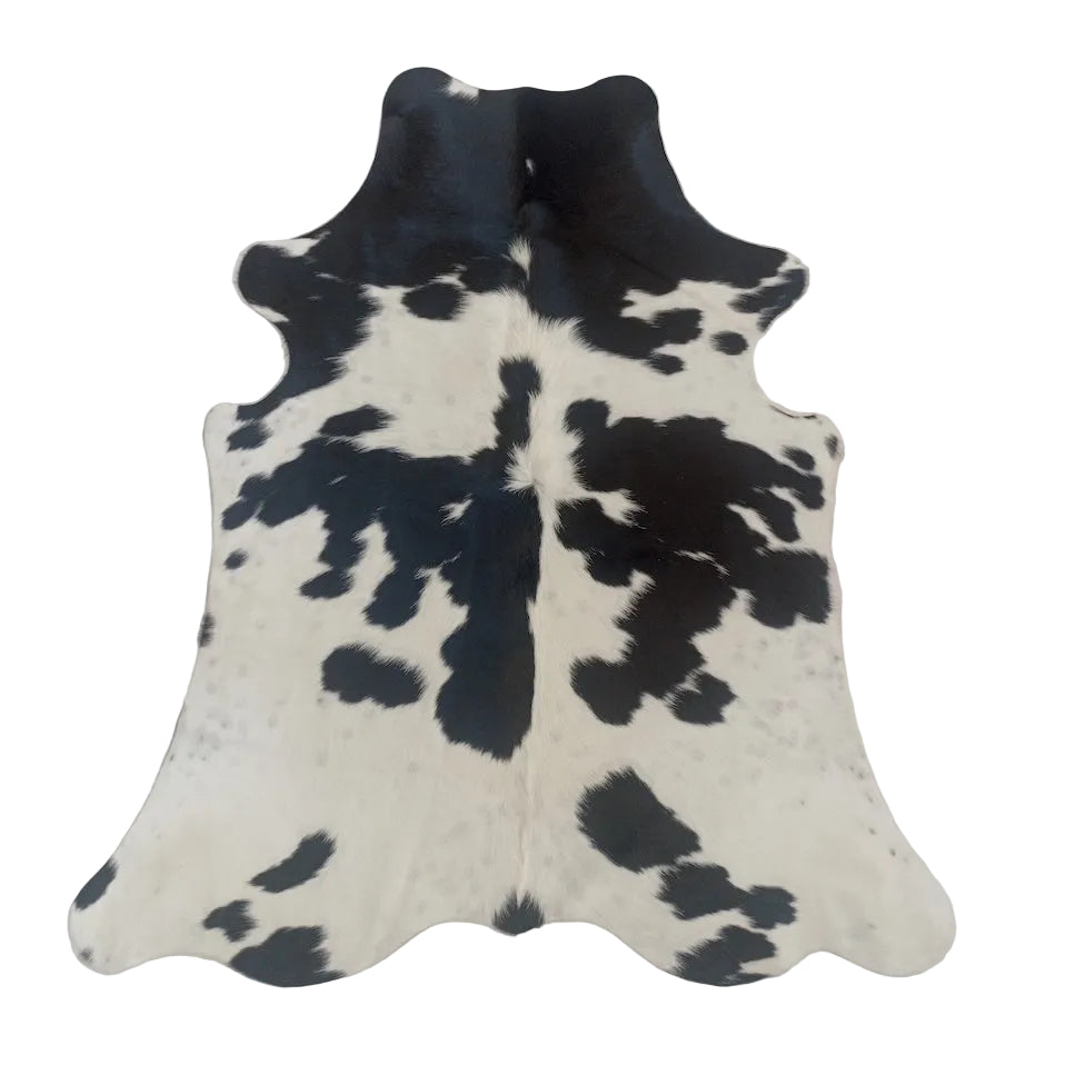 Cowhide Rug in natural tones, size 1.84m x 1.50m, from Cowhide Rugs London, showcasing its unique pattern and soft texture.